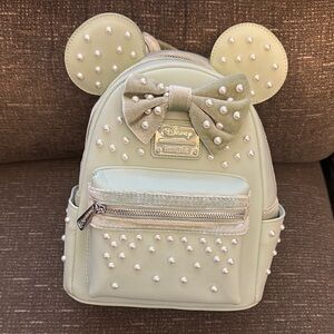 Disney Green Backpack with Iconic Ears and Whimsical Design
